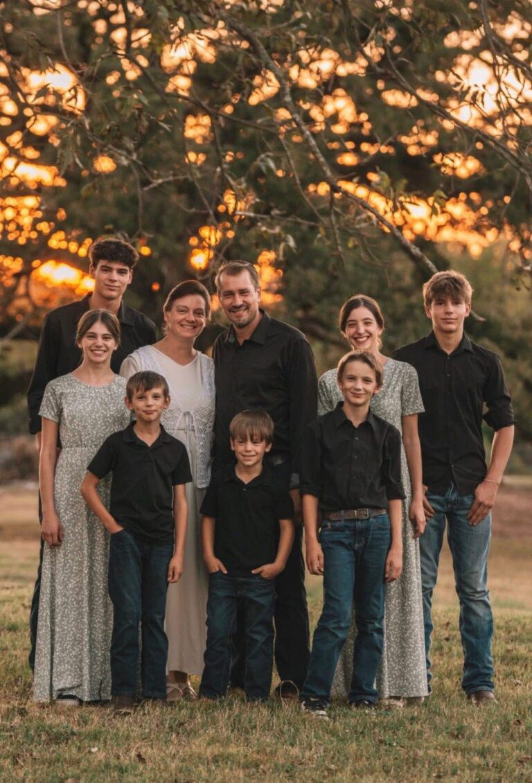 The Hidden Ranch Doodles family together outdoors.